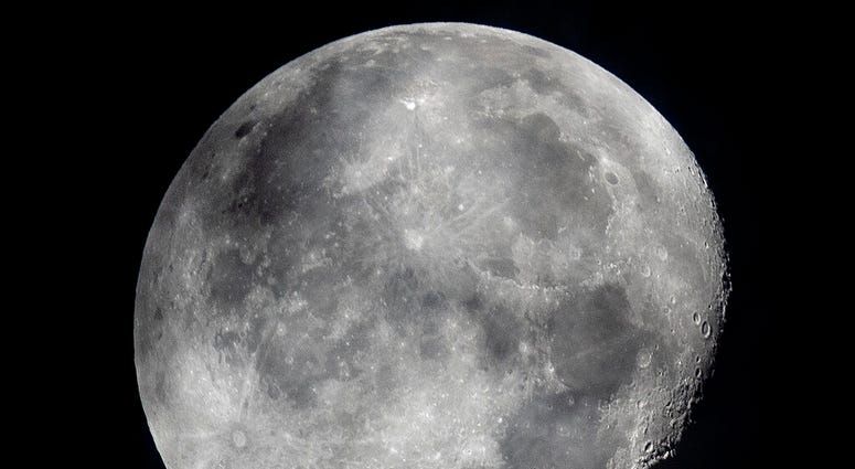 In this early Monday, Oct. 5, 2020, file photo, a waning moon is seen at the sky over Frankfurt, Germany. (AP Photo/Michael Probst, File) In this early Monday, Oct. 5, 2020, file photo, a waning moon is seen at the sky over Frankfurt, Germany. (AP Photo/Michael Probst, File)
