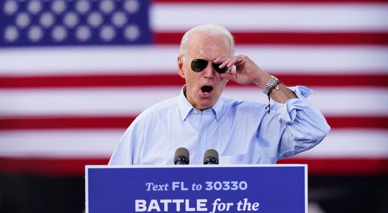 Democratic presidential candidate former Vice President Joe Biden speaks at a drive-in rally at Broward College, Thursday, Oct. 29, 2020, in Coconut Creek, Fla. (AP Photo/Andrew Harnik) Democratic presidential candidate former Vice President Joe Biden speaks at a drive-in rally at Broward College, Thursday, Oct. 29, 2020, in Coconut Creek, Fla. (AP Photo/Andrew Harnik)