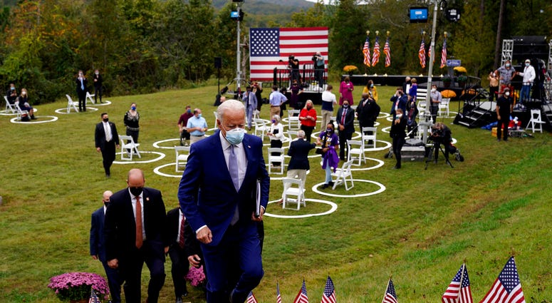 Democratic presidential candidate former Vice President Joe Biden leaves after speaking at Mountain Top Inn & Resort, Tuesday, Oct. 27, 2020, in Warm Springs, Ga. (AP Photo/Andrew Harnik) Democratic presidential candidate former Vice President Joe Biden leaves after speaking at Mountain Top Inn & Resort, Tuesday, Oct. 27, 2020, in Warm Springs, Ga. (AP Photo/Andrew Harnik)