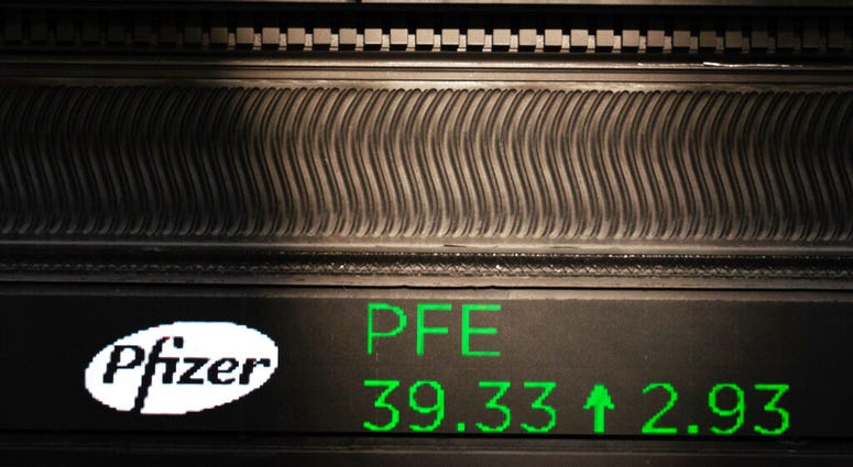 A stock ticker with Pfizer stock information is shown at the New York Stock Exchange, Monday, Nov. 9, 2020. (AP Photo/Mark Lennihan) A stock ticker with Pfizer stock information is shown at the New York Stock Exchange, Monday, Nov. 9, 2020. (AP Photo/Mark Lennihan)