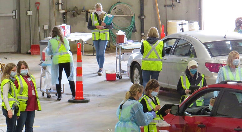 This 2020 photo provided by Carlton County shows their drive-thru flu clinic in Carlton, Minn. (Jared Hovi/Carlton County GIS via AP) This 2020 photo provided by Carlton County shows their drive-thru flu clinic in Carlton, Minn. (Jared Hovi/Carlton County GIS via AP)