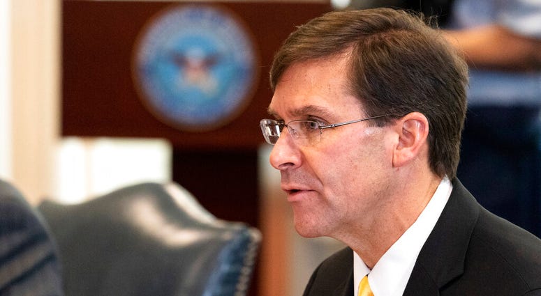 In this Oct. 8, 2020, file photo, Secretary of Defense Mark Esper speaks before a meeting with Romanian Defense Minister Nicolae Ciuca, at the Pentagon, in Washington. (AP Photo/Alex Brandon, File) In this Oct. 8, 2020, file photo, Secretary of Defense Mark Esper speaks before a meeting with Romanian Defense Minister Nicolae Ciuca, at the Pentagon, in Washington. (AP Photo/Alex Brandon, File)