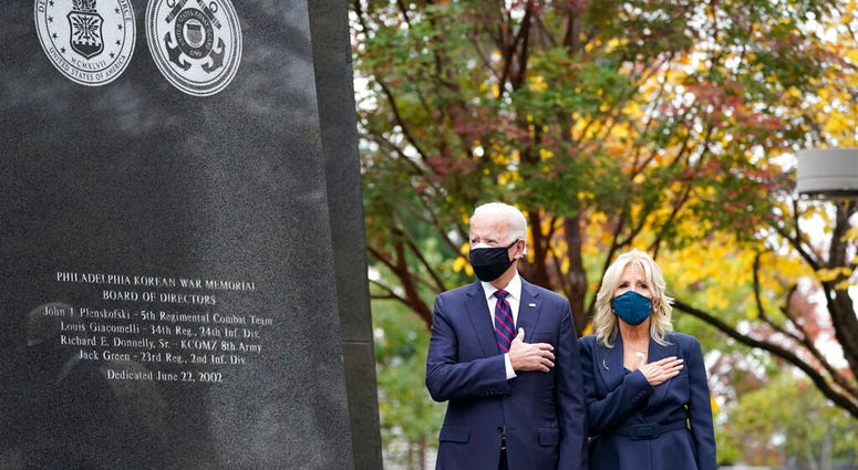 President-elect Joe Biden and Jill Biden, attend a service at the Philadelphia Korean War Memorial at Penn's Landing on Veterans Day, Wednesday, Nov. 11, 2020, in Philadelphia. (AP Photo/Alex Brandon) President-elect Joe Biden and Jill Biden, attend a service at the Philadelphia Korean War Memorial at Penn's Landing on Veterans Day, Wednesday, Nov. 11, 2020, in Philadelphia. (AP Photo/Alex Brandon)