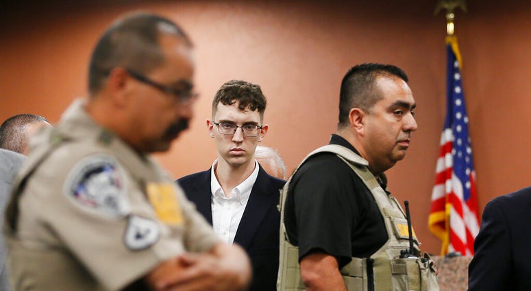 FILE - In the is Oct. 10, 2019 file photo, El Paso Walmart shooting suspect Patrick Crusius pleads not guilty during his arraignment in El Paso, Texas. (Briana Sanchez / El Paso Times via AP, Pool, File) FILE - In the is Oct. 10, 2019 file photo, El Paso Walmart shooting suspect Patrick Crusius pleads not guilty during his arraignment in El Paso, Texas. (Briana Sanchez / El Paso Times via AP, Pool, File)