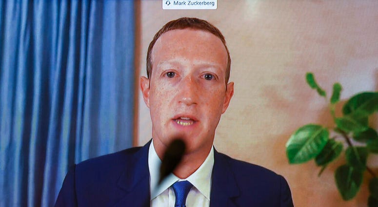 Facebook CEO Mark Zuckerberg testifies remotely during a Senate Judiciary Committee hearing on Facebook and Twitter's actions around the closely contested election on Tuesday, Nov. 17, 2020, in Washington. (Hannah McKay/Pool via AP) Facebook CEO Mark Zuckerberg testifies remotely during a Senate Judiciary Committee hearing on Facebook and Twitter's actions around the closely contested election on Tuesday, Nov. 17, 2020, in Washington. (Hannah McKay/Pool via AP)