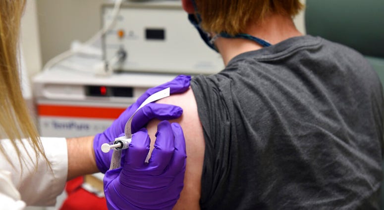 This May 4, 2020, file photo provided by the University of Maryland School of Medicine, shows the first patient enrolled in Pfizer's COVID-19 coronavirus vaccine clinical trial. (Courtesy of University of Maryland School of Medicine via AP, File) This May 4, 2020, file photo provided by the University of Maryland School of Medicine, shows the first patient enrolled in Pfizer's COVID-19 coronavirus vaccine clinical trial. (Courtesy of University of Maryland School of Medicine via AP, File)