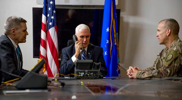 File photo Vice President Mike Pence, accompanied by U.S. Ambassador to Iraq Matthew Tueller, left, and Lt. Gen. Pat White, right, takes a phone call with Iraqi Prime Minister Adil Abdul-Mahdi at Al Asad Air Base, Iraq. (AP Photo/Andrew Harnik, File) File photo Vice President Mike Pence, accompanied by U.S. Ambassador to Iraq Matthew Tueller, left, and Lt. Gen. Pat White, right, takes a phone call with Iraqi Prime Minister Adil Abdul-Mahdi at Al Asad Air Base, Iraq. (AP Photo/Andrew Harnik, File)