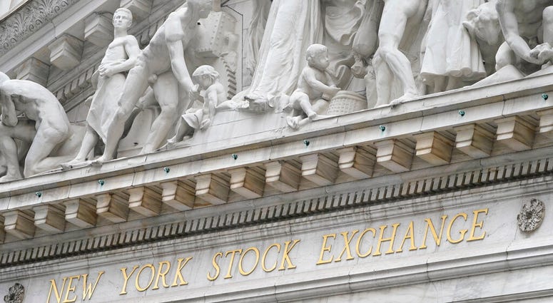 The sign is displayed at the New York Stock Exchange in New York, Monday, Nov. 23, 2020. (AP Photo/Seth Wenig) The sign is displayed at the New York Stock Exchange in New York, Monday, Nov. 23, 2020. (AP Photo/Seth Wenig)