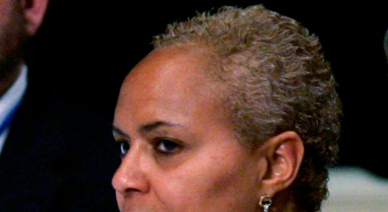 FILE- In this May 31, 2008 file photo, Tina Flournoy, then Democratic National Committee Rules and Bylaws committee member, during a hearing in Washington. (AP Photo/Susan Walsh) FILE- In this May 31, 2008 file photo, Tina Flournoy, then Democratic National Committee Rules and Bylaws committee member, during a hearing in Washington. (AP Photo/Susan Walsh)