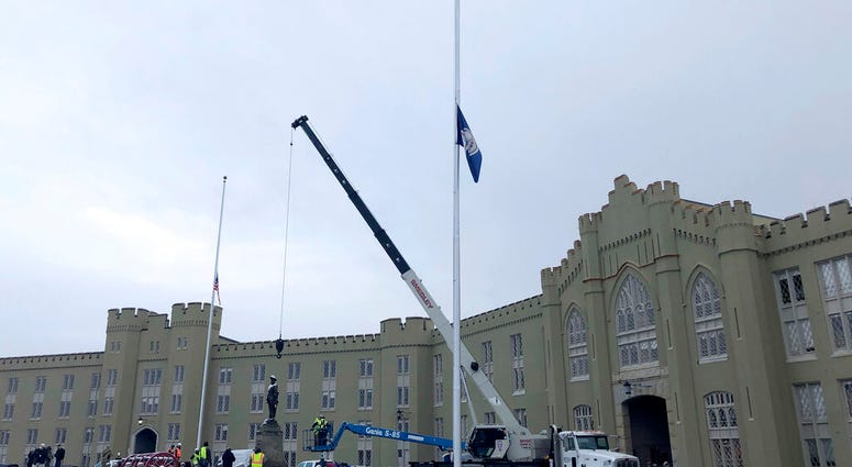 Crews prepare to remove a statue of Confederate Gen. Thomas "Stonewall" Jackson from the campus of the Virginia Military Institute on Monday, Dec. 7, 2020, in Lexington, Va. (AP Photo/Sarah Rankin) Crews prepare to remove a statue of Confederate Gen. Thomas "Stonewall" Jackson from the campus of the Virginia Military Institute on Monday, Dec. 7, 2020, in Lexington, Va. (AP Photo/Sarah Rankin)