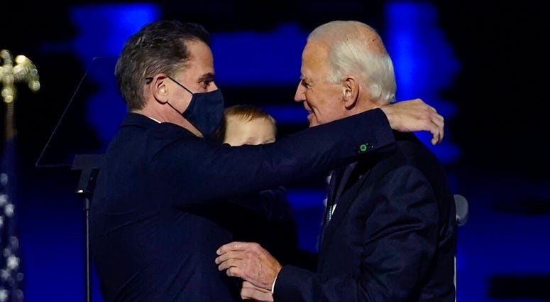 In this Nov. 7, 2020, file photo, Presidenet-elect Joe Biden, right, embraces his son Hunter Biden, left, in Wilmington, Del. (AP Photo/Andrew Harnik, Pool) In this Nov. 7, 2020, file photo, Presidenet-elect Joe Biden, right, embraces his son Hunter Biden, left, in Wilmington, Del. (AP Photo/Andrew Harnik, Pool)
