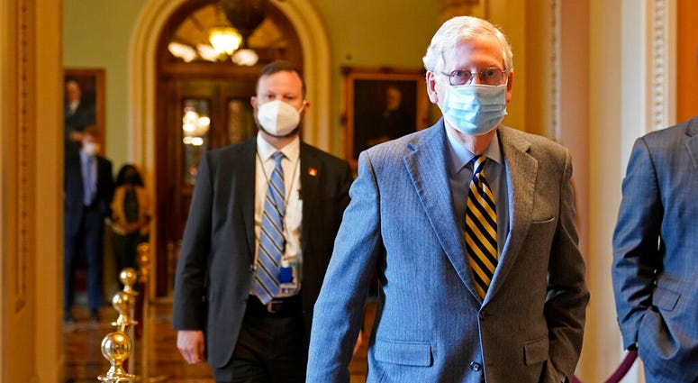 Senate Majority Leader Mitch McConnell of Ky., walks back to his office on Capitol Hill in Washington, Wednesday, Dec. 30, 2020. (AP Photo/Susan Walsh) Senate Majority Leader Mitch McConnell of Ky., walks back to his office on Capitol Hill in Washington, Wednesday, Dec. 30, 2020. (AP Photo/Susan Walsh)