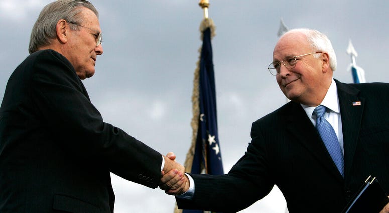 In this Dec. 15, 2006, file photo, outgoing Defense Secretary Donald H. Rumsfeld, left, shakes hands with Vice President Dick Cheney during an Armed Forces Full Honor Review for Rumsfeld at the Pentagon. (AP Photo/Pablo Martinez Monsivais, File) In this Dec. 15, 2006, file photo, outgoing Defense Secretary Donald H. Rumsfeld, left, shakes hands with Vice President Dick Cheney during an Armed Forces Full Honor Review for Rumsfeld at the Pentagon. (AP Photo/Pablo Martinez Monsivais, File)