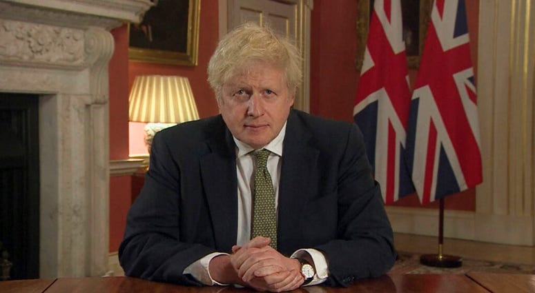 In this image taken from video, Britain's Prime Minister Boris Johnson makes a televised address to the nation from 10 Downing Street, London, Monday Jan. 4, 2021. (Pool via AP) In this image taken from video, Britain's Prime Minister Boris Johnson makes a televised address to the nation from 10 Downing Street, London, Monday Jan. 4, 2021. (Pool via AP)