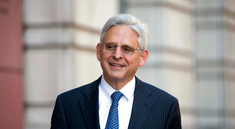 FILE - In this Nov. 17, 2017, file photo, Merrick Garland walks into Federal District Court in Washington. President-elect Joe Biden is set to name Garland as Attorney General.