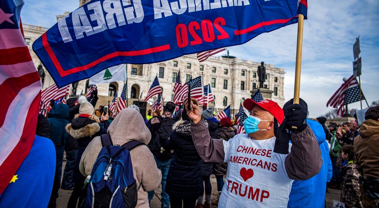 Protesters attended a rally in support of President Donald Trump on the steps of the Minnesota State Capitol on Wednesday, Jan. 6, 2021 in St. Paul, Minn.