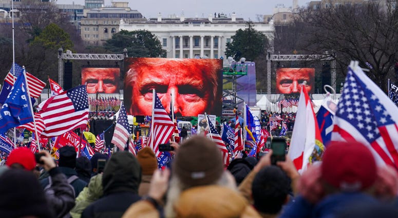 Trump supporters participate in a rally Wednesday, Jan. 6, 2021 in Washington.