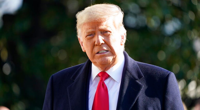 President Donald Trump speaks to the media before boarding Marine One on the South Lawn of the White House, Tuesday, Jan. 12, 2021 in Washington. The President is traveling to Texas. (AP Photo/Gerald Herbert) President Donald Trump speaks to the media before boarding Marine One on the South Lawn of the White House, Tuesday, Jan. 12, 2021 in Washington. The President is traveling to Texas. (AP Photo/Gerald Herbert)
