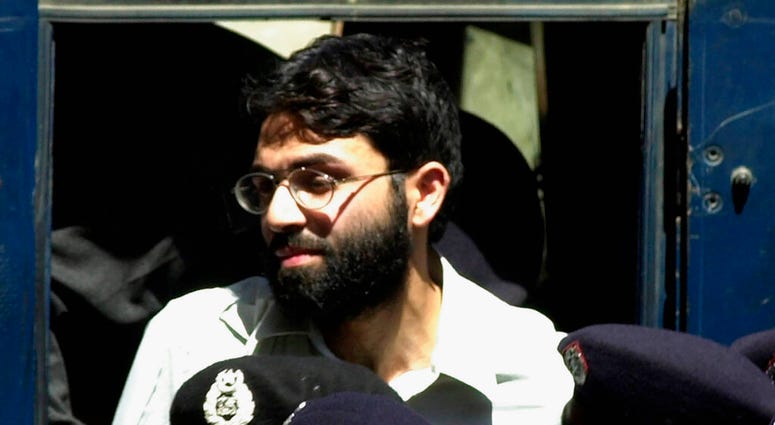 FILE - In this March 29, 2002 file photo, Ahmed Omar Saeed Sheikh, the alleged mastermind behind Wall Street Journal reporter Daniel Pearl's kidnap-slaying, appears at the court in Karachi, Pakistan.