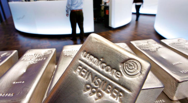 FILE - In this file photo dated Wednesday, May 9, 2007, Silver bullion, bars weighing five kilograms each, are displayed in the trading room of the stock exchange in Frankfurt, Germany.