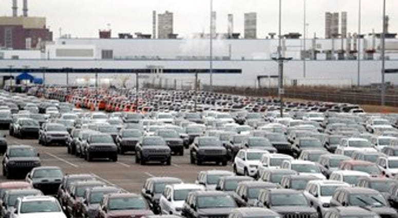 FILE - In this Feb. 26, 2019, file photo, Jeep vehicles are parked outside the Jefferson North Assembly Plant in Detroit. (AP Photo/Carlos Osorio, File) FILE - In this Feb. 26, 2019, file photo, Jeep vehicles are parked outside the Jefferson North Assembly Plant in Detroit. (AP Photo/Carlos Osorio, File)