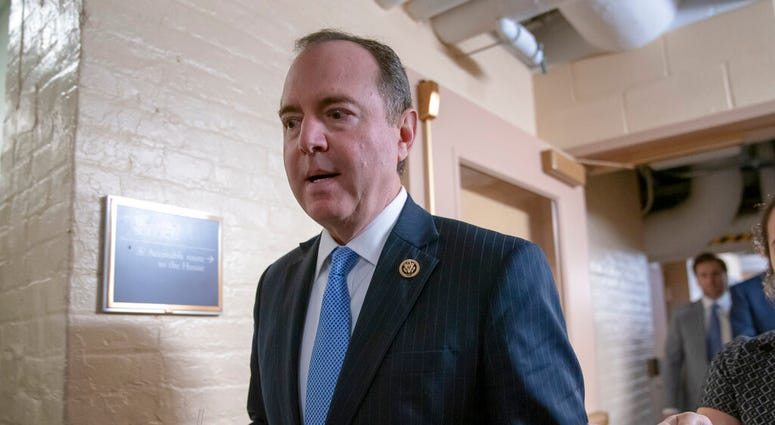House Intelligence Committee Chairman Adam Schiff, D-Calif., arrives for a Democratic Caucus meeting in Washington. Schiff says Mueller's conclusion would not affect his own committee's counterintelligence probes. (AP Photo/J. Scott Applewhite)