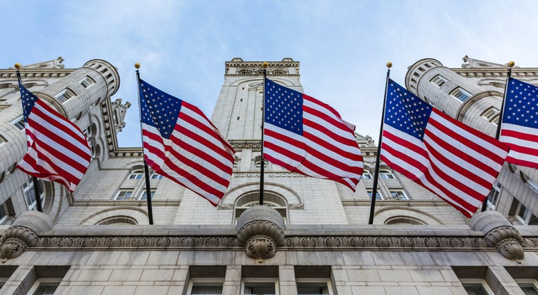 American Flags at Trump Hotel in DC (Dreamstime)