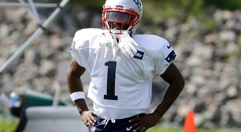 New England Patriots wide receiver Antonio Brown pauses while working out during NFL football practice, Wednesday, Sept. 11, 2019, in Foxborough, Mass. (AP Photo/Steven Senne)