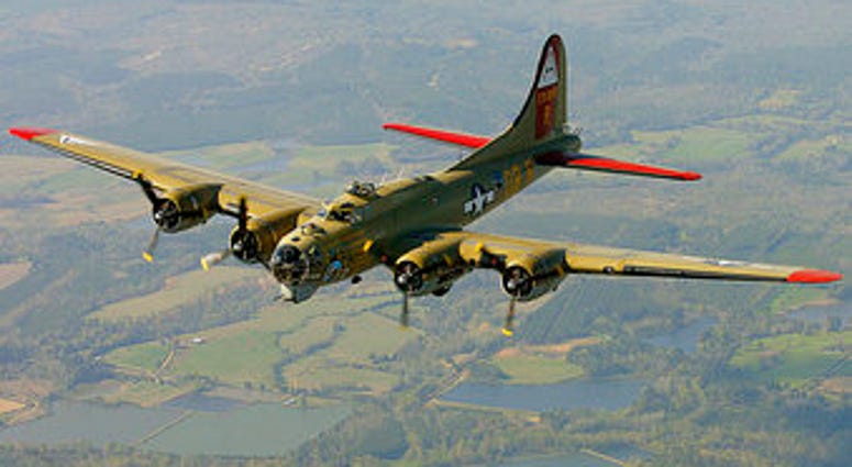 The Nine-O-Nine, a Collings Foundation B-17 Flying Fortress, flies over Thomasville, Ala., during its journey from Decatur, Ala., to Mobile, Ala. (John David Mercer/Press-Register via AP, File)