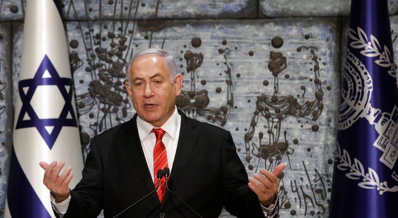 FILE - In this Wednesday, Sept. 25, 2109 file photo, Israeli Prime Minister Benjamin Netanyahu gives a statement in Jerusalem. (AP Photo/Sebastian Scheiner, File)