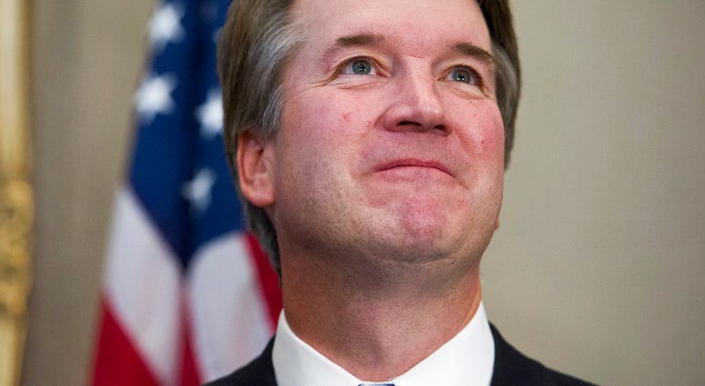 Supreme Court nominee Brett Kavanaugh before meeting with Sen. Dan Sullivan, R-Alaska, Thursday, July 12, 2018, on Capitol Hill in Washington. (AP Photo/Cliff Owen)