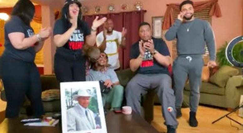 In this still image from video provided by the NFL, Chase Young, seated in center, talks on his cellphone during the NFL football draft Thursday, April 23, 2020. (NFL via AP) In this still image from video provided by the NFL, Chase Young, seated in center, talks on his cellphone during the NFL football draft Thursday, April 23, 2020. (NFL via AP)
