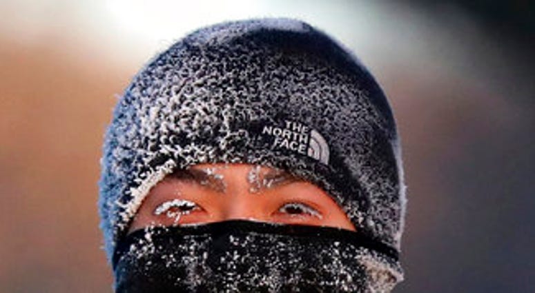 A runner wears the cold on his face while running along West River Parkway hills Thursday, Feb. 13, 2020, near downtown Minneapolis, with temperatures hovering near minus 30 degrees Fahrenheit with wind chills. (David Joles/Star Tribune via AP) A runner wears the cold on his face while running along West River Parkway hills Thursday, Feb. 13, 2020, near downtown Minneapolis, with temperatures hovering near minus 30 degrees Fahrenheit with wind chills. (David Joles/Star Tribune via AP)