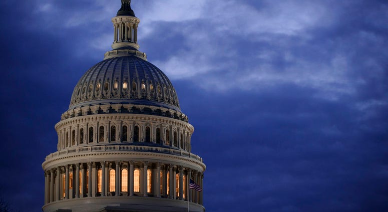 FILE - In this March 30, 2017, file photo, the Capitol Dome is seen at dawn in Washington. The Senate has kicked off its annual attempt to pass government funding bills. Success is hardly assured, but President Donald Trump has warned Congress that he wil