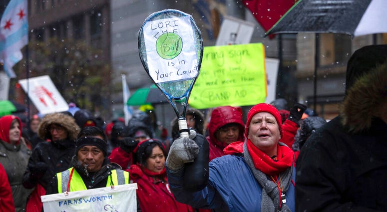 Members of the Chicago Teachers Union rally in downtown Chicago on Thursday, Oct. 31, 2019. (Pat Nabong/Chicago Sun-Times via AP)