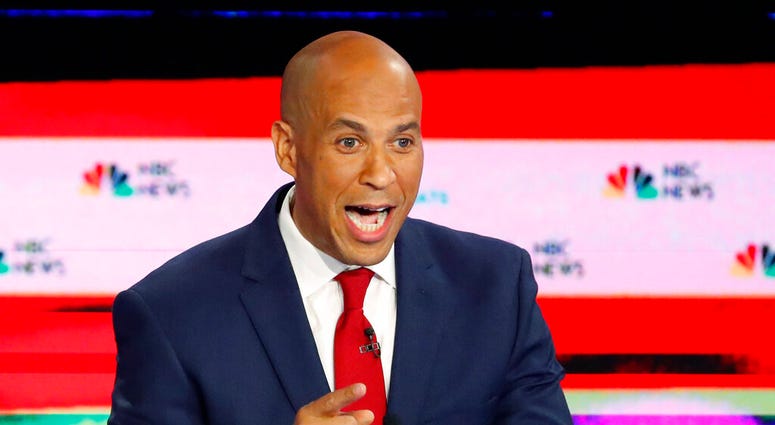 In this June 26, 2019 photo, Democratic presidential candidate Sen. Cory Booker, D-N.J., speaks during a Democratic primary debate hosted by NBC News at the Adrienne Arsht Center for the Performing Art, in Miami. (AP Photo/Wilfredo Lee)