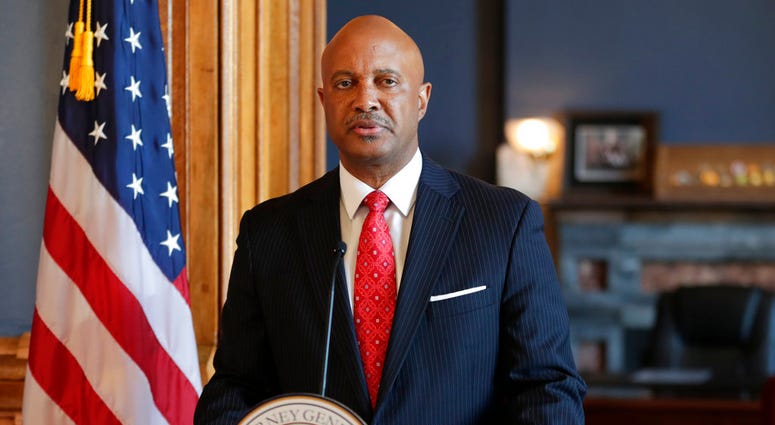 Indiana Attorney General Curtis Hill speaks during a news conference at the Statehouse in Indianapolis, Monday, July 9, 2018. Hill is rejecting calls to resign, saying his name "has been dragged through the gutter" amid allegations that he inappropriately