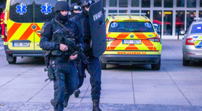Police personnel outside the Ostrava Teaching Hospital after a shooting incident in Ostrava, Czech Republic, Tuesday, Dec. 10, 2019. (Vladimir Prycek/CTK via AP) Police personnel outside the Ostrava Teaching Hospital after a shooting incident in Ostrava, Czech Republic, Tuesday, Dec. 10, 2019. (Vladimir Prycek/CTK via AP)