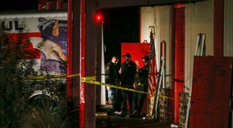 Officials work a crime scene after a shooting at Party Venue on Highway 380 in Greenville, Texas, on Sunday, Oct. 27, 2019. (Ryan Michalesko/The Dallas Morning News via AP)