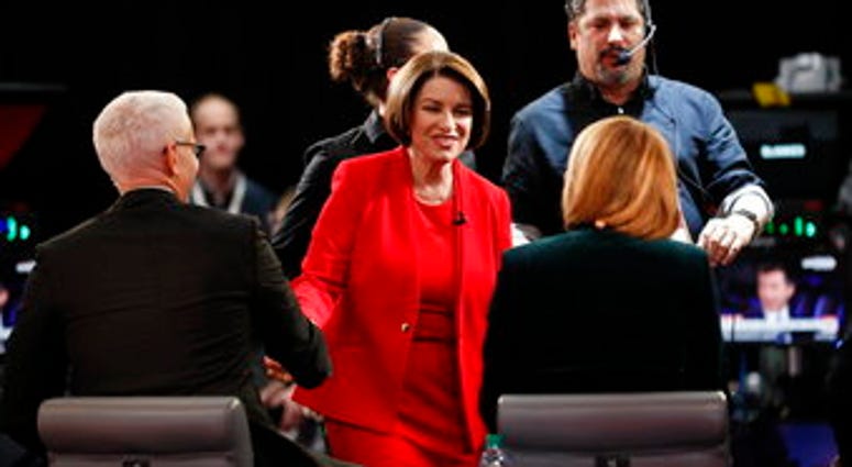 Democratic presidential candidate Sen. Amy Klobuchar, D-Minn., prepares to be interviewed in the spin room Tuesday, Jan. 14, 2020, after a Democratic presidential primary debate. (AP Photo/Charlie Neibergall) Democratic presidential candidate Sen. Amy Klobuchar, D-Minn., prepares to be interviewed in the spin room Tuesday, Jan. 14, 2020, after a Democratic presidential primary debate. (AP Photo/Charlie Neibergall)