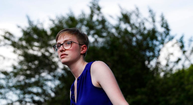 Adelia Johnson, who briefly dated Connor Betts, who fatally gunned down people on Sunday in Dayton, Ohio, speaks to members of the media in Belmont Park in Dayton on Tuesday, Aug. 6, 2019. (AP Photo/John Minchillo)