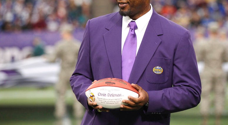FILE - In this Dec. 15, 2013, file photo, former Minnesota Viking Chris Doleman acknowledges the crowd during a ceremony honoring the All Mall of America Field team during halftime of an NFL football game. (AP Photo/Andy King, File) FILE - In this Dec. 15, 2013, file photo, former Minnesota Viking Chris Doleman acknowledges the crowd during a ceremony honoring the All Mall of America Field team during halftime of an NFL football game. (AP Photo/Andy King, File)