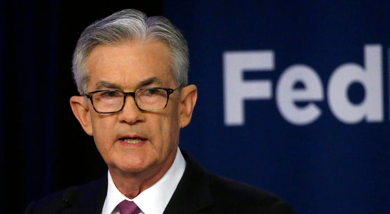 FILE - In this June 4, 2019, file photo Federal Reserve Chairman Jerome Powell speaks at a conference involving its review of its interest-rate policy strategy and communications in Chicago. (AP Photo/Kiichiro Sato, File)