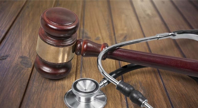 Gavel Stethsecope (Dreamstime)