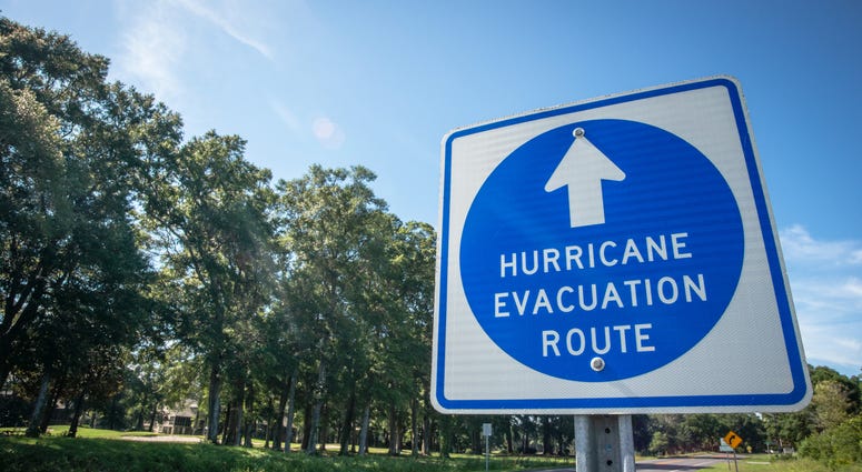 A sign directs hurricane evacuees to safety.