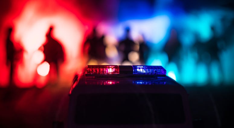 Police cars at night. Police car chasing a car at night with fog background.