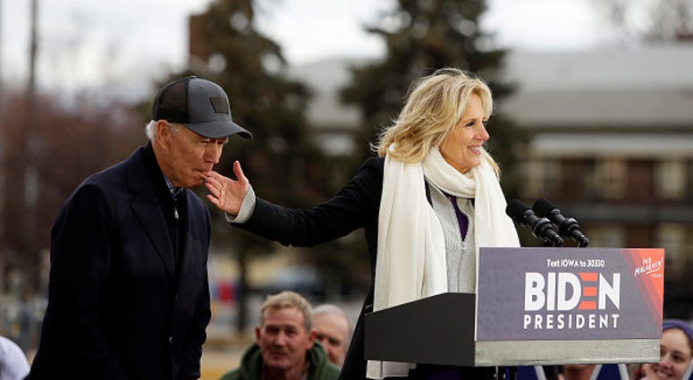 Joe Biden bites wife's hand