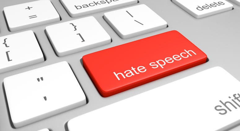 computer keyboard with one key labeled for hate speech, representing discriminatory messages that plague online message boards and comment areas.