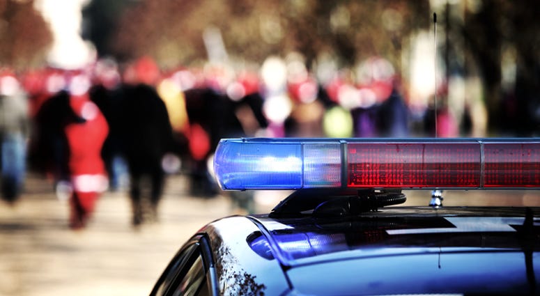 Flashing police siren escort during the demonstration
