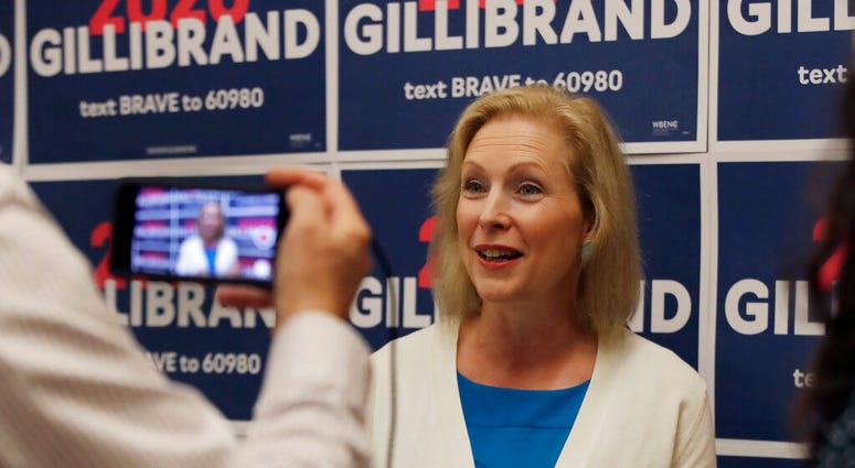 Democratic presidential candidate Sen. Kirsten Gillibrand, D-N.Y., speaks to a reporter after a mental health roundtable discussion, Tuesday, Aug. 20, 2019, in Manchester, N.H. (AP Photo/Elise Amendola)